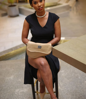 Denri Africa's beige Montana Sling Bag. Minimalist sling bag, warm beige tone, perfect for everyday routines.