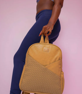Denri Africa's beige Monah Backpack. Light beige backpack, elegant everyday carry, perfect for books or laptop.