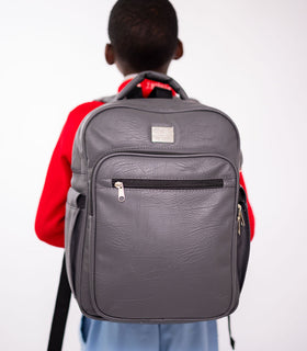 Denri Africa's gray Pioneer Backpack. Gray multipurpose backpack, water-resistant outer fabric, school or travel use.