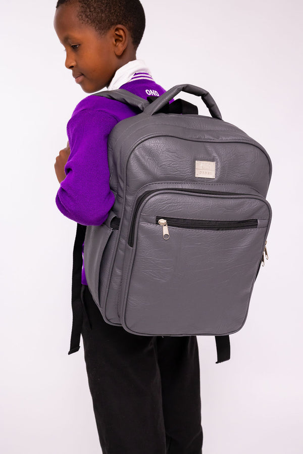 Denri Africa's gray Pioneer Backpack. Spacious anti-theft school backpack, sturdy fabric, everyday student bag.