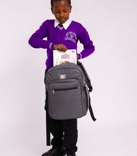 Denri Africa's gray Pioneer Backpack. Sleek gray commuter backpack, minimalist design, comfortable padded back panel.