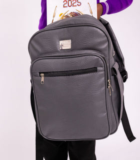 Denri Africa's gray Pioneer Backpack. Urban grey backpack, water-resistant school bag, roomy compartment for books or laptop.