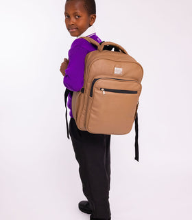 Denri Africa's beige Pioneer Backpack. Beige multipurpose backpack, subtle tone, practical for urban commute or study.