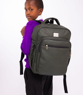 Denri Africa's green Pioneer Backpack. Green versatile backpack, roomy main compartment and secure build for daily essentials.