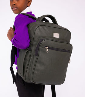 Denri Africa's green Pioneer Backpack. Green laptop backpack, ergonomic back panel, suitable for work or school.
