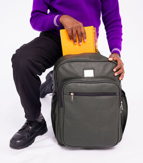 Denri Africa's green Pioneer Backpack. Forest-green backpack, anti-theft design, ideal for students and commuters.