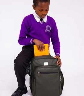 Denri Africa's green Pioneer Backpack. Green commuter backpack, roomy compartments, sturdy straps for daily travel.