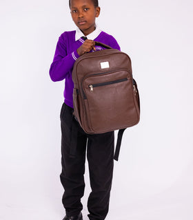 Denri Africa's brown Pioneer Backpack. Brown durable backpack, large main compartment, practical for students and professionals.