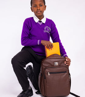 Denri Africa's brown Pioneer Backpack. Brown student backpack, water-resistant finish, functional and stylish.