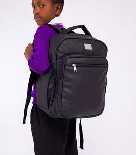 Denri Africa's black Pioneer Backpack. Black commuter backpack, built for students or professionals on the go.