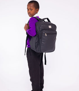 Denri Africa's black Pioneer Backpack. Black heavy-duty backpack, ergonomic straps, daily carry comfort.