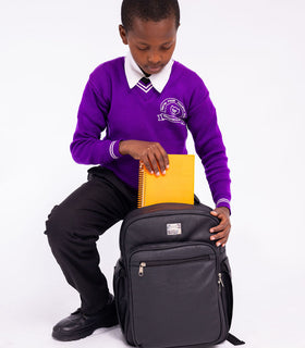 Denri Africa's black Pioneer Backpack. Black anti-theft travel backpack, side bottle holders, padded back support.