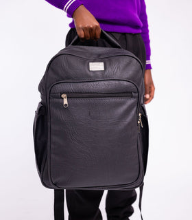 Denri Africa's black Pioneer Backpack. Black urban backpack, minimalist design, suitable for commuters and travelers.
