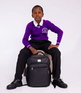 Denri Africa's black Pioneer Backpack. Black laptop-ready backpack, padded straps and back panel, sleek urban style.