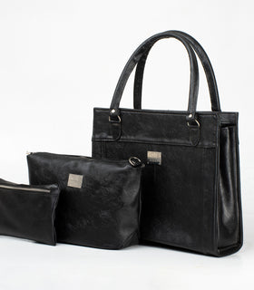 Denri Africa's black Jamela Laptop Handbag. Sleek women’s laptop bag, professional vegan leather handbag, versatile office and casual bag.