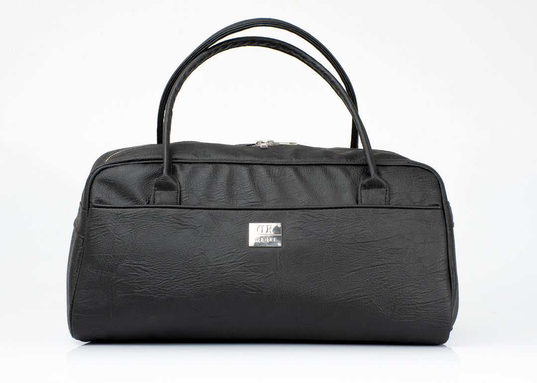 Denri Africa's black KAZ Travel Bag. Classic black travel duffle, durable vegan leather carry bag, perfect for business or leisure travel.