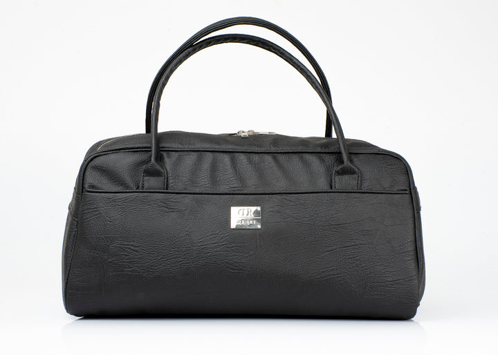 Denri Africa's black KAZ Travel Bag. Classic black travel duffle, durable vegan leather carry bag, perfect for business or leisure travel.
