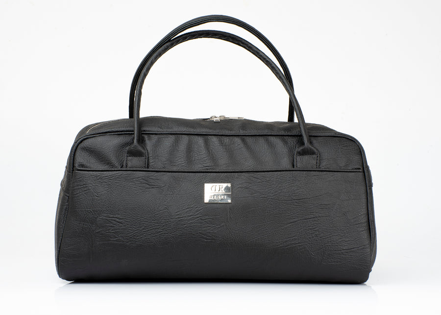 Denri Africa's black KAZ Travel Bag. Classic black travel duffle, durable vegan leather carry bag, perfect for business or leisure travel.