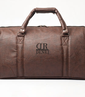 Denri Africa's brown Jumbo Travel Bag. Spacious travel duffle, durable vegan leather design, perfect for long trips.