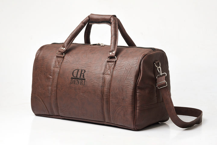 Denri Africa's brown Jumbo Travel Bag. Oversized duffle bag, stylish brown travel carryall, strong vegan leather build.