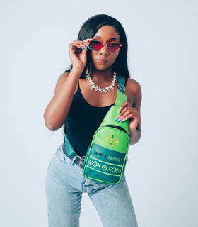 Denri Africa’s green Denri x Manyatta Crossbody Bag. Slim crossbody bag, deep green finish, practical hands-free carry for daily essentials.