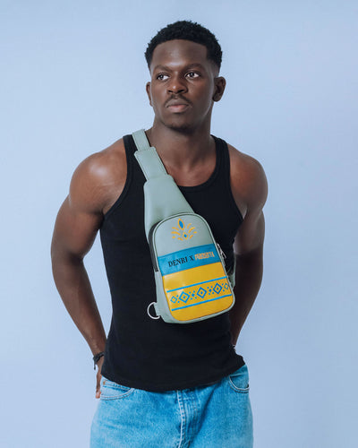 Denri Africa’s blue Denri x Manyatta Crossbody Bag. Sleek crossbody bag, lightweight vegan-leather sling, modern urban style.